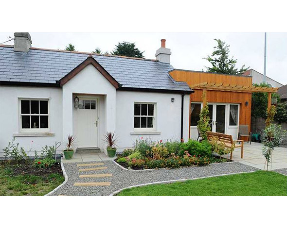 The cottage with the timber extension to the side